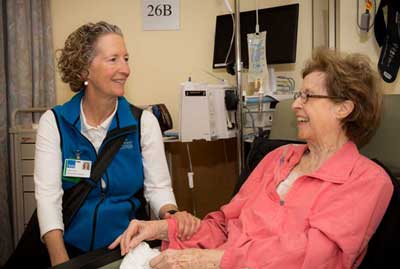 Volunteer Comforting Patient